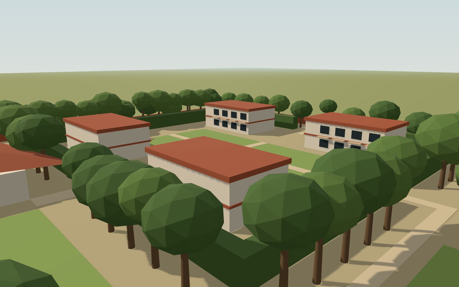 The guest precinct from above: four two-storey blocks screened by a hedge and trees